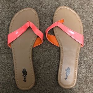 Pink/coral flip flops